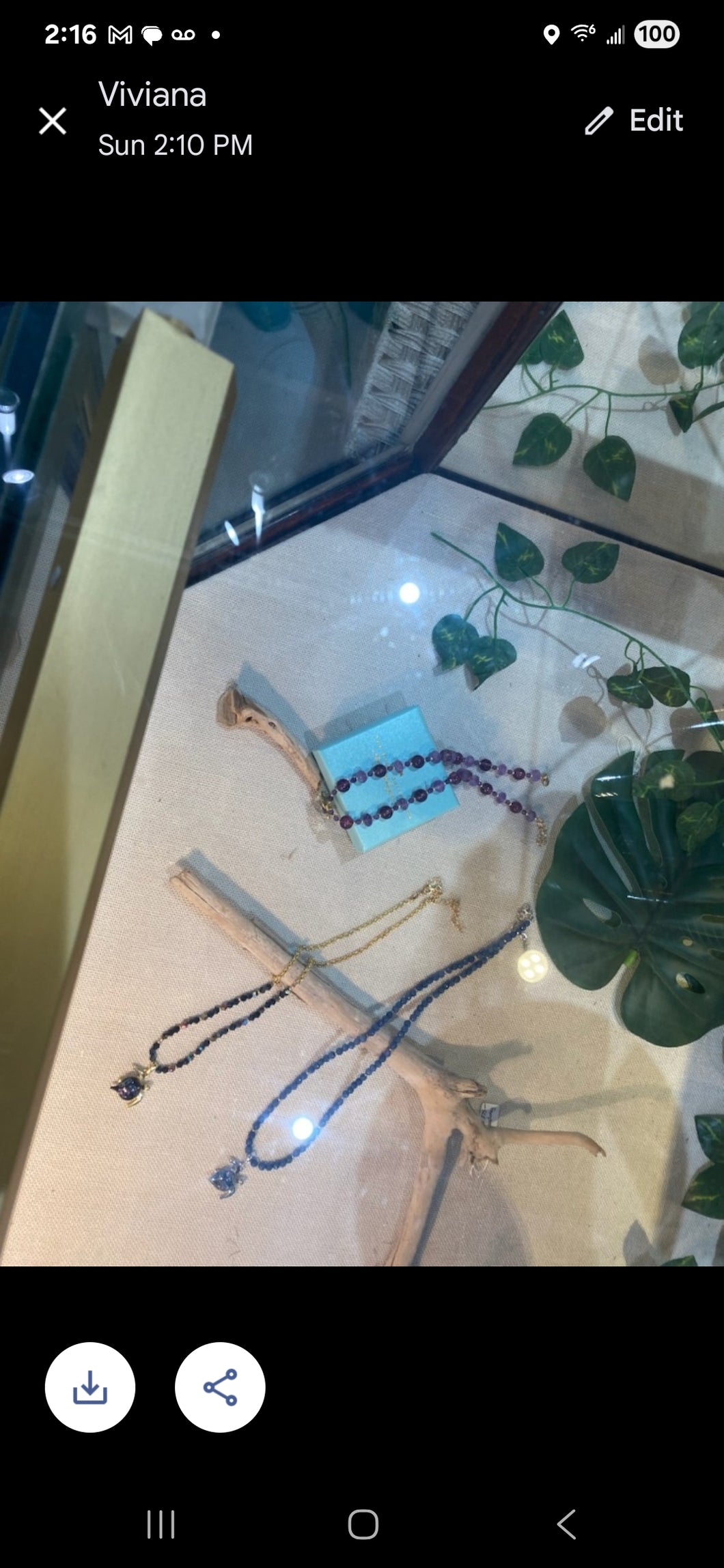 Special order Malama necklace in the glass case